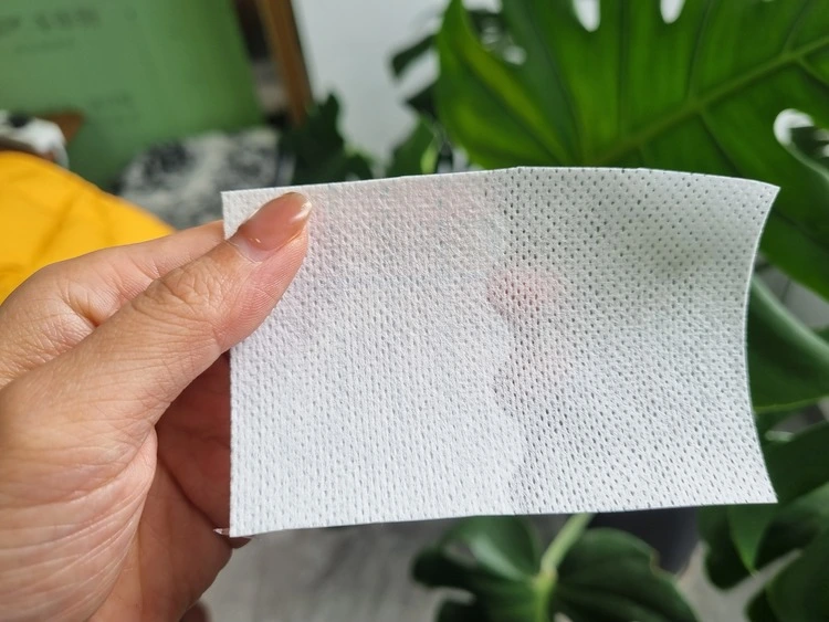 Structure of non woven dressing roll with medical adhesive and release liner